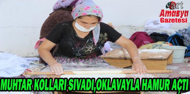 Muhtar kolları sıvadı, oklavayla hamur açtı